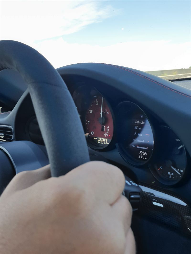 Porsche 911 GTS on a European tour road, June 2019