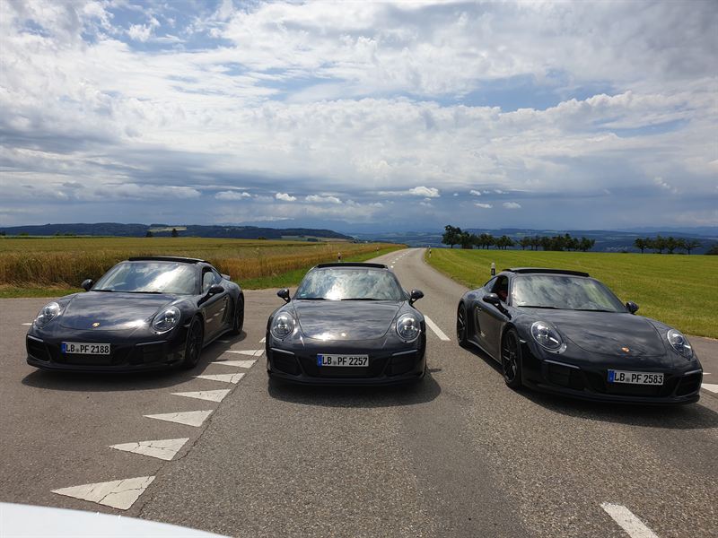 Porsche 911 lineup at the Bavarian hotel courtyard
