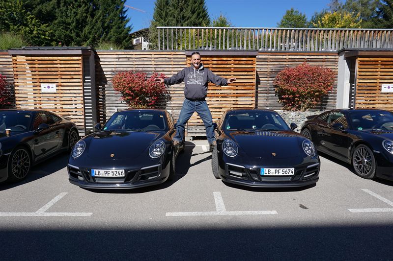 Porsche 911 lineup — Bavarian hotel courtyard