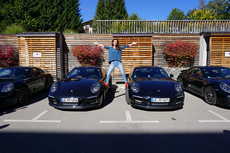 Four Porsche 911s at the Tyrolean hotel — alternate frame